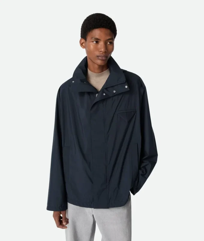 Blouson con capucha de nailon plegable