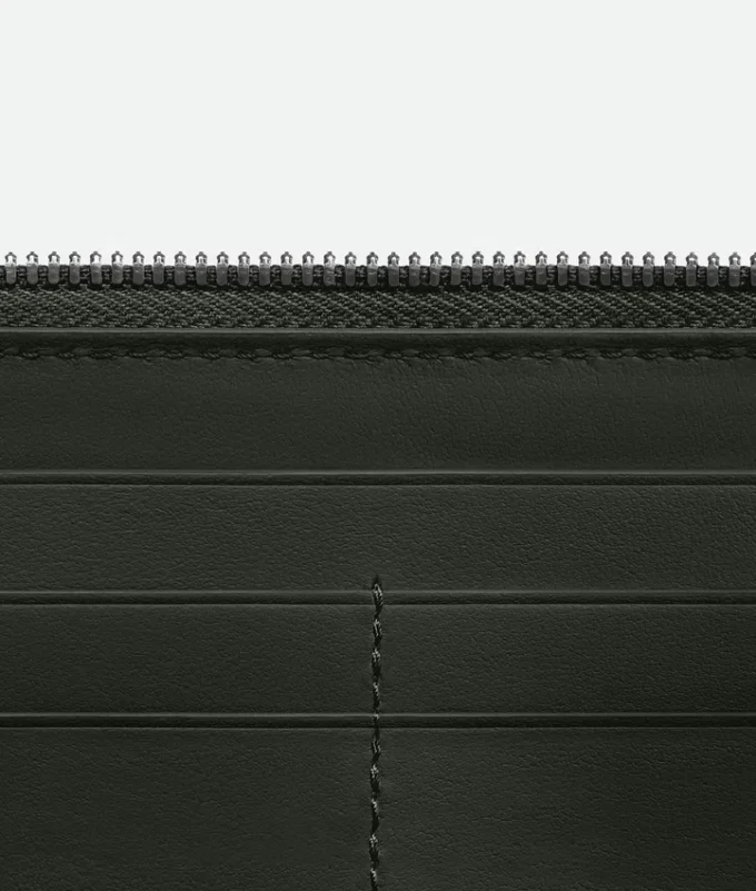 Cartera con cremallera diagonal Intrecciata