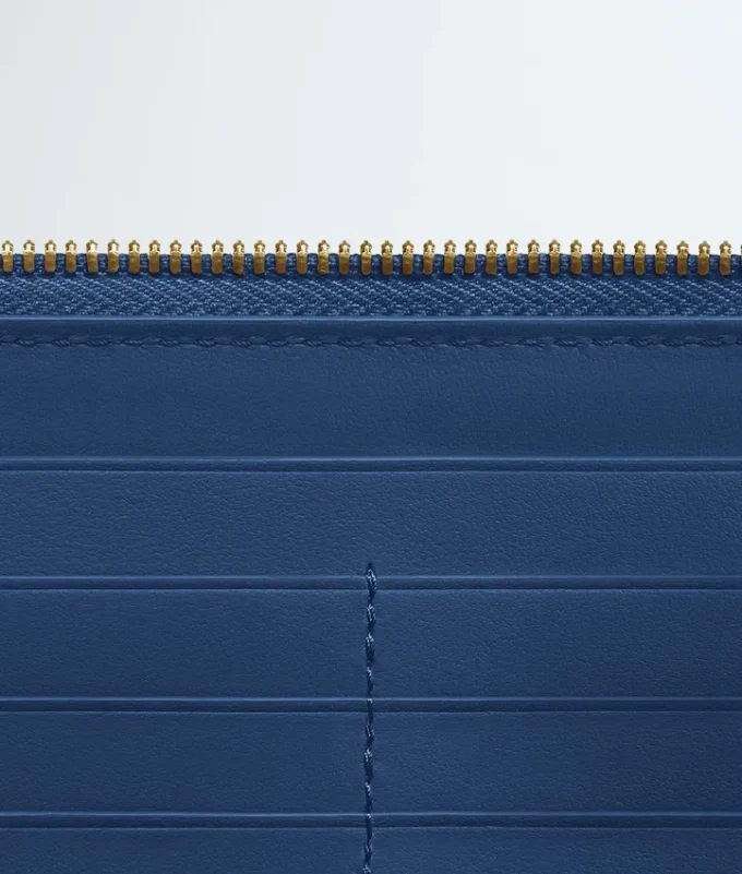 Cartera con cremallera Intrecciata