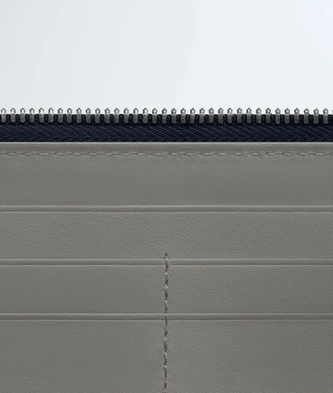 Cartera con cremallera Intrecciata