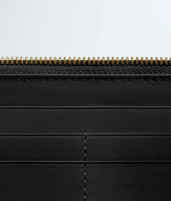 Cartera con cremallera Intrecciata