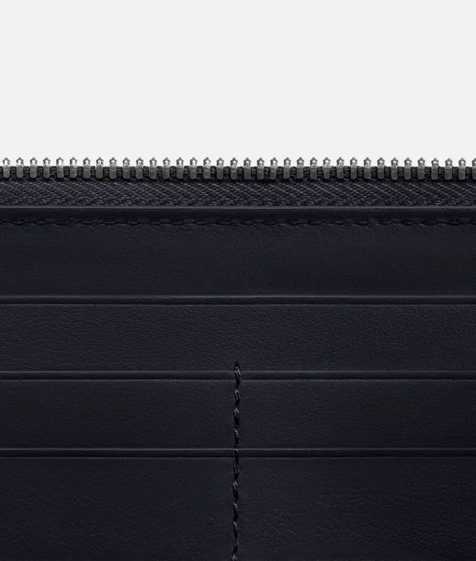 Cartera con cremallera Intrecciata