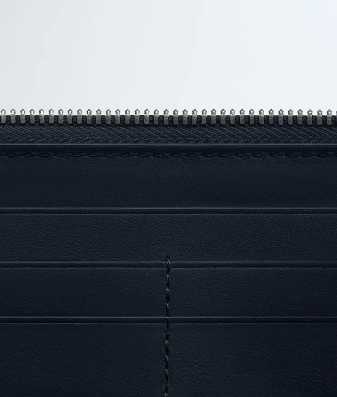 Cartera con cremallera Intrecciata